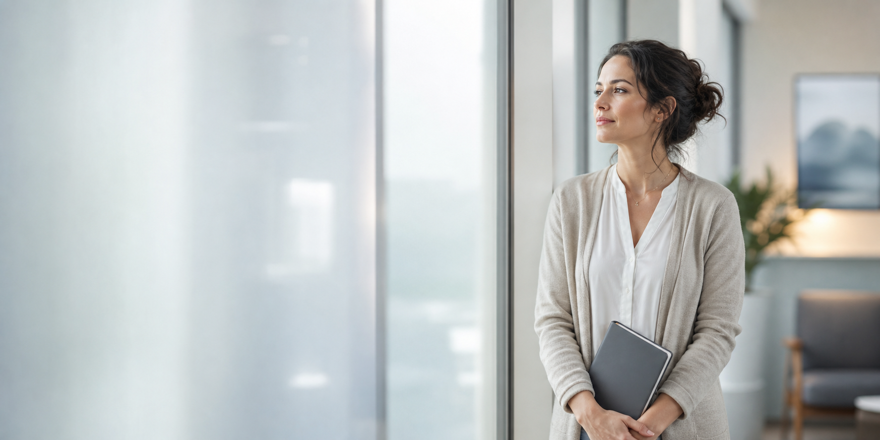 Woman standing calmly in a private medical office